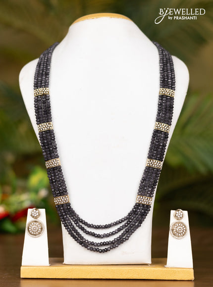 Beaded multilayer grey necklace with floral pendant in victorian finish