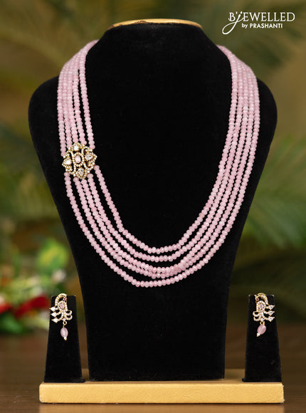 Beaded pink multilayer necklace with peacock pendant in victorian finish