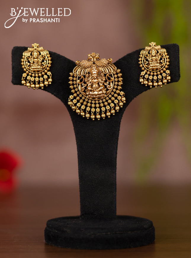 Antique pendant set with lakshmi design and golden beads hangings