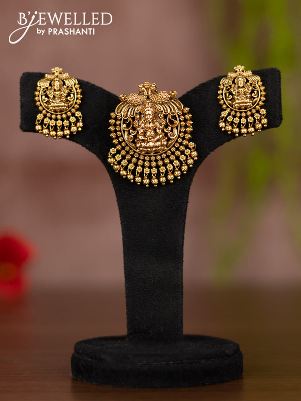 Antique pendant set with lakshmi design and golden beads hangings