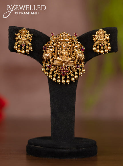 Antique pendant set lakshmi design with ruby stones and golden beads hangings