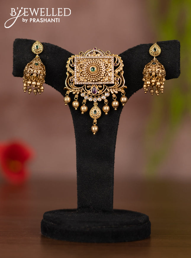 Antique pendant set with kemp & cz stones and golden beads hangings