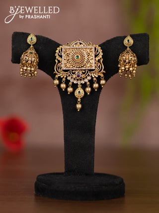 Antique pendant set with kemp & cz stones and golden beads hangings