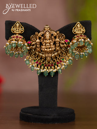 Antique pendant set lakshmi design with kemp stones and mint green beads hangings