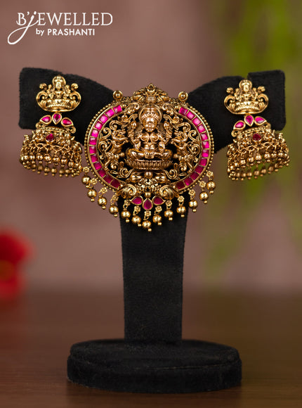 Antique pendant set lakshmi design with pink jadau stones and golden beads hangings