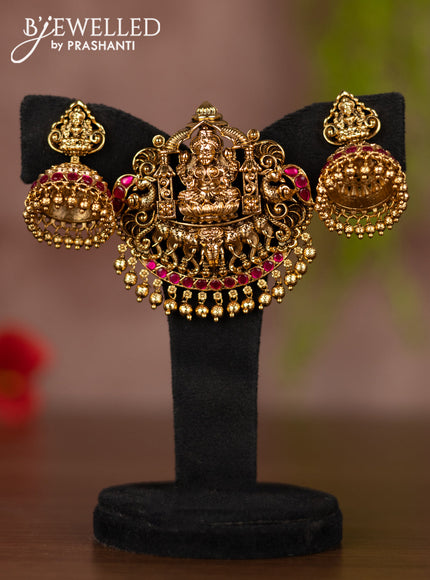 Antique pendant set lakshmi design with pink jadau stones and golden beads hangings