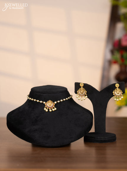Pearl choker with lakshmi pendant in cz and kemp stones