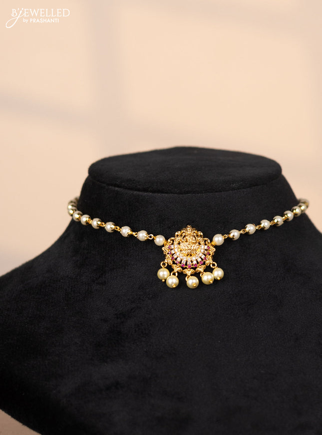 Pearl choker with lakshmi pendant in cz and kemp stones