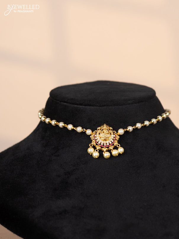 Pearl choker with lakshmi pendant in cz and kemp stones