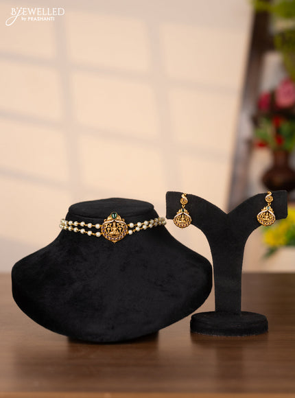 Pearl choker with lakshmi pendant in cz and kemp stones