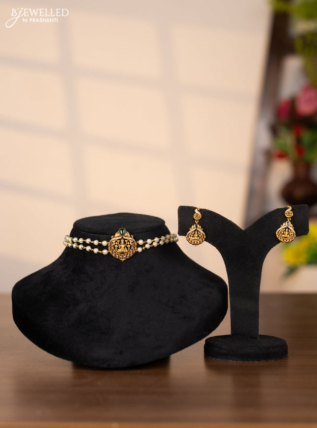 Pearl choker with lakshmi pendant in cz and kemp stones