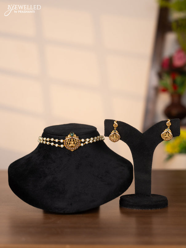 Pearl choker with lakshmi pendant in cz and kemp stones