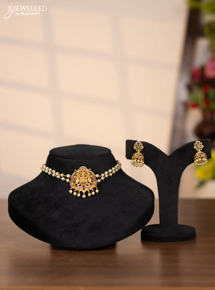 Pearl choker with lakshmi pendant in green and kemp stones