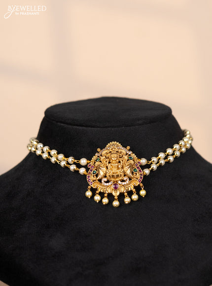 Pearl choker with lakshmi pendant in green and kemp stones