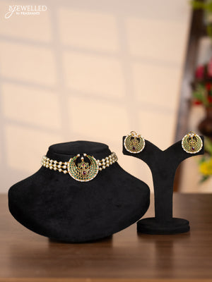 Pearl choker with chandbali pendant in green stones