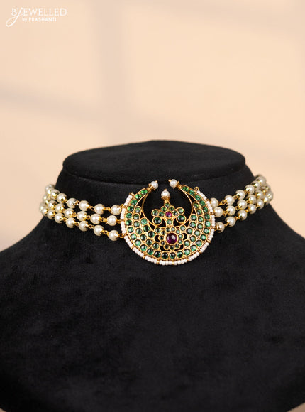 Pearl choker with chandbali pendant in green stones