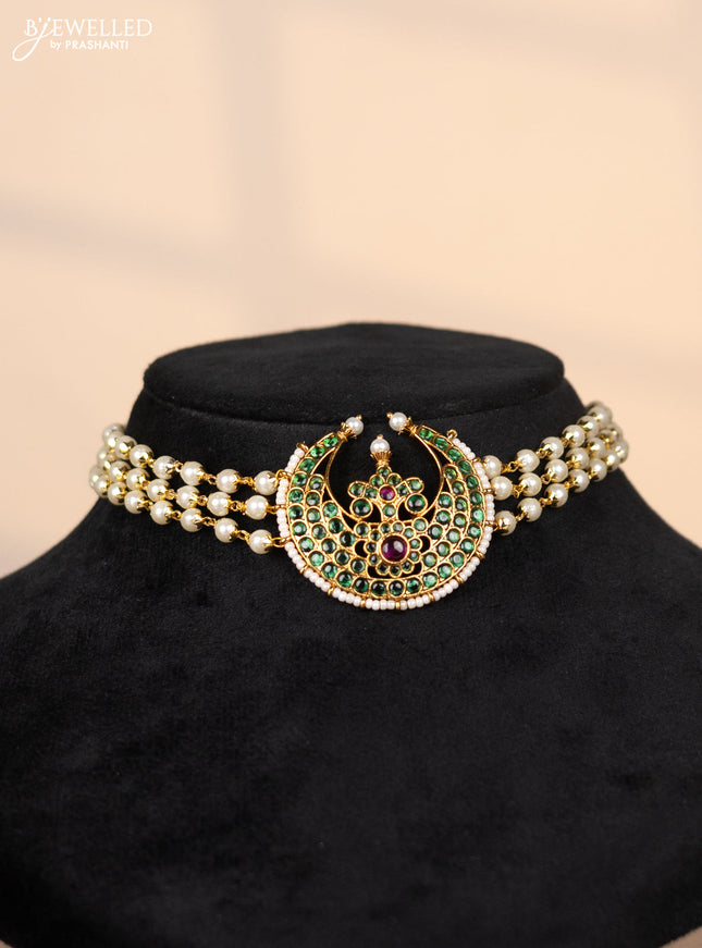 Pearl choker with chandbali pendant in green stones