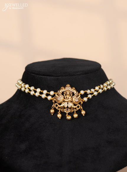 Pearl choker with lakshmi pendant in cz stones