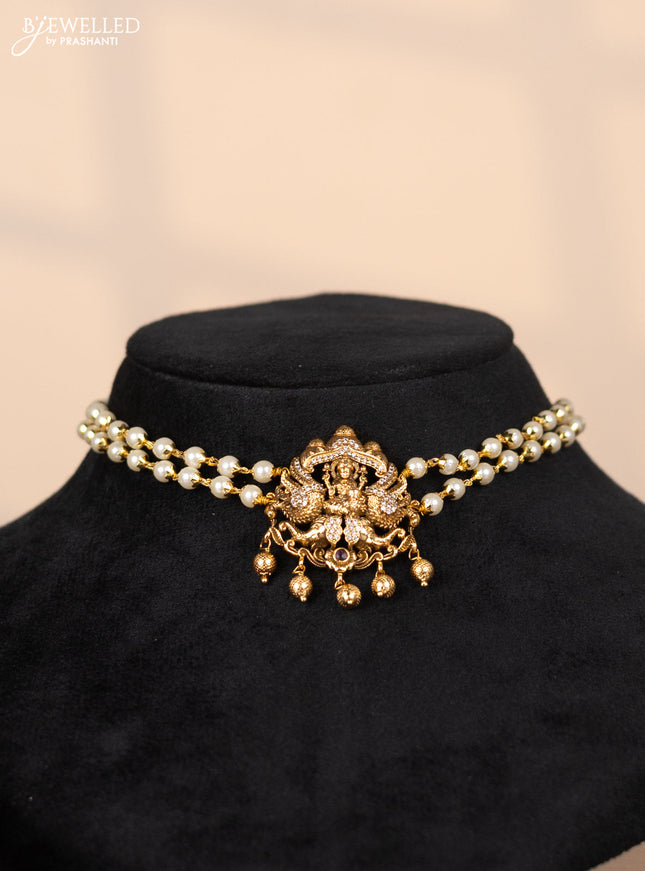 Pearl choker with lakshmi pendant in cz stones