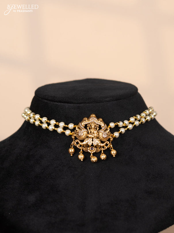 Pearl choker with lakshmi pendant in cz stones