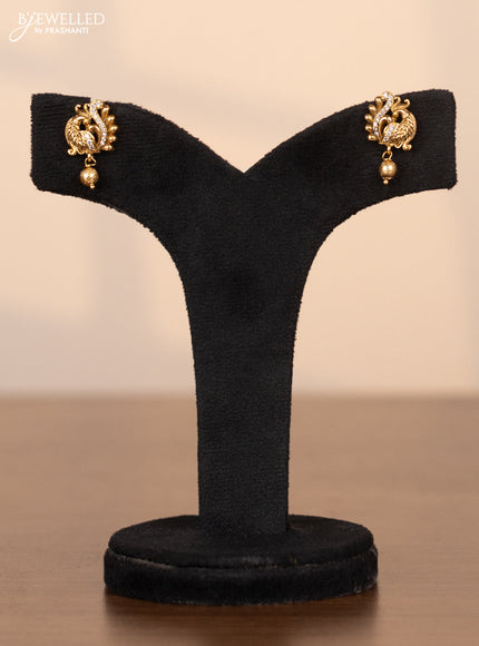 Pearl choker with lakshmi pendant in cz stones