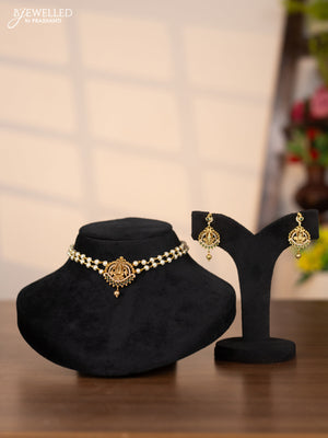 Pearl choker with balaji pendant in cz and green stones