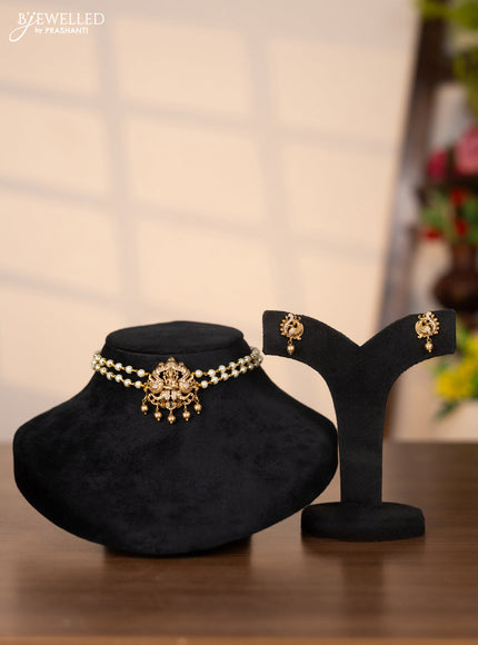 Pearl choker with lakshmi pendant in cz stones