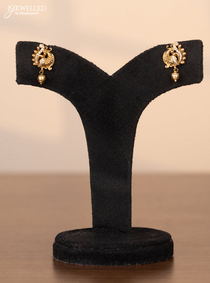 Pearl choker with lakshmi pendant in cz stones