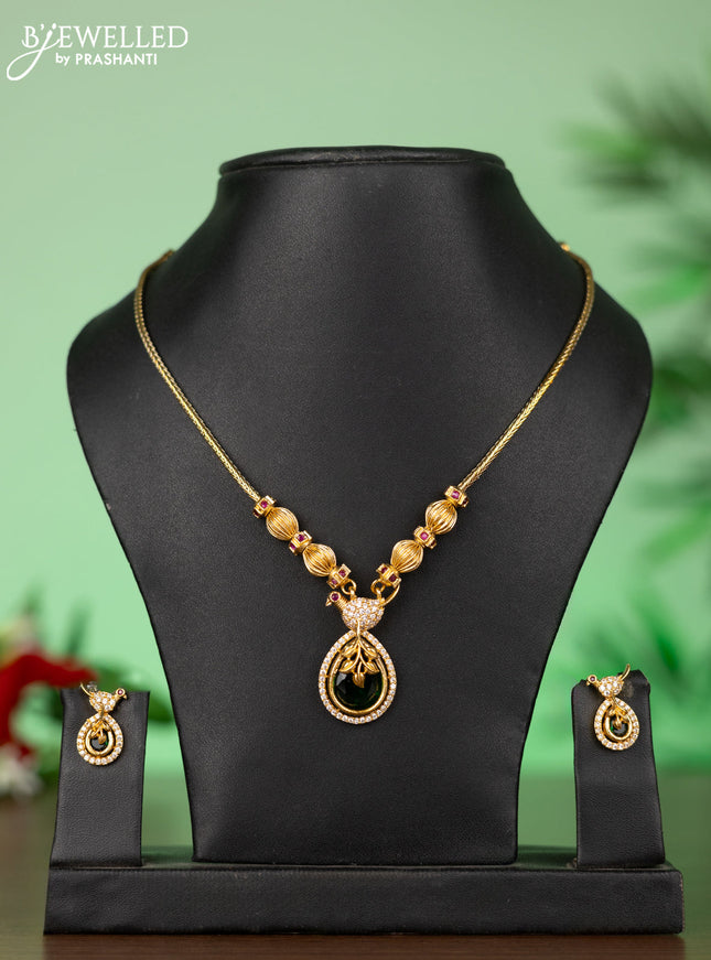 Attigai necklace with parrot pendant in green and white stones