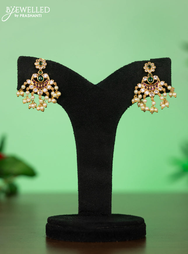 Attigai necklace with chandbali pendant in kemp,green stones and pearl hangings