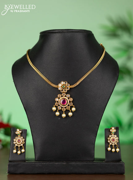 Attigai necklace with circle pendant in kemp,green stones and pearl hangings