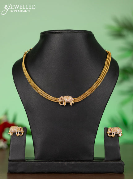 Attigai necklace with elephant pendant in white stones