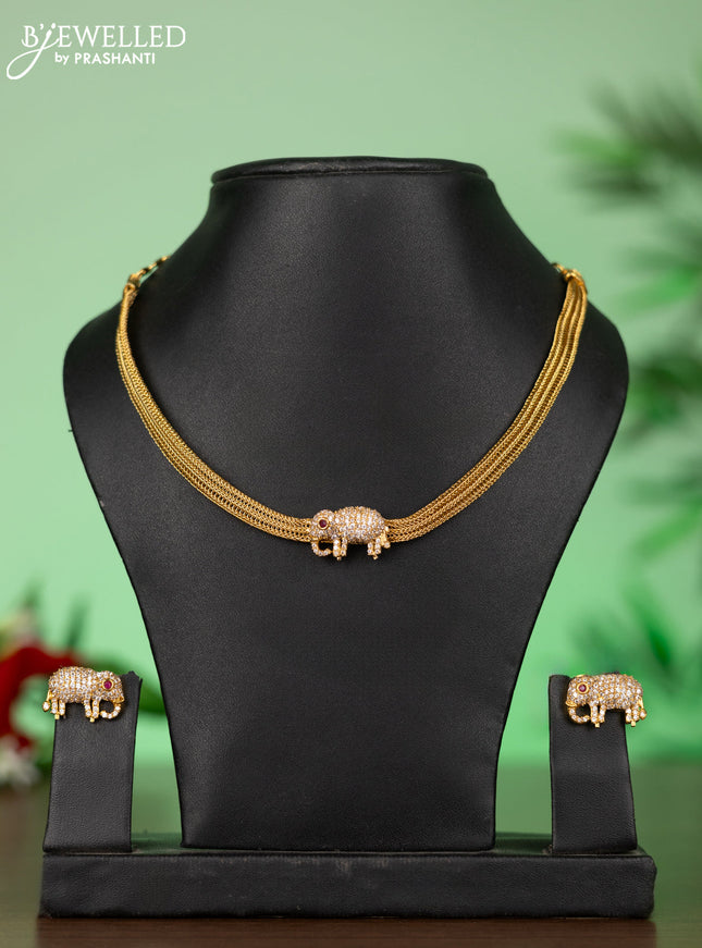 Attigai necklace with elephant pendant in white stones