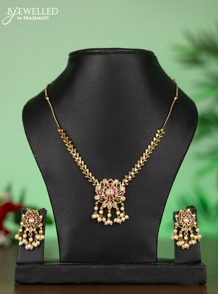 Attigai necklace with lotus pendant in kemp and white stones & pearl hangings