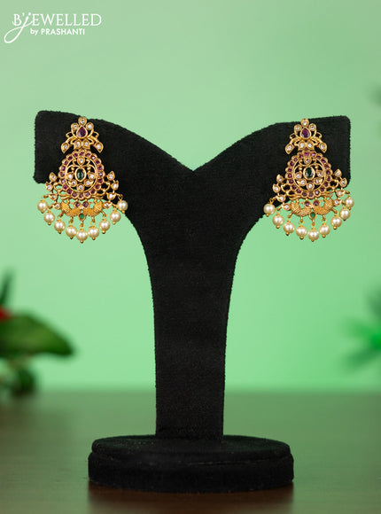 Attigai necklace with floral pendant in kemp ,white and green stones and pearl hanging