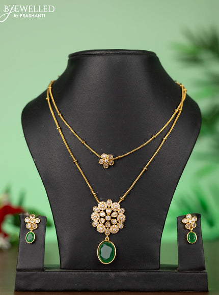Attigai necklace with floral pendant in green stones