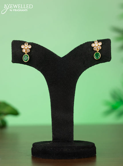 Attigai necklace with floral pendant in green stones