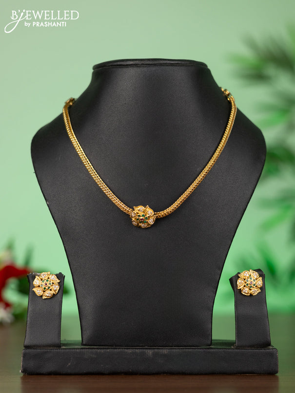 Attigai necklace with floral pendant in kemp ,white and green stones