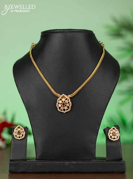 Attigai necklace with floral pendant in red stones