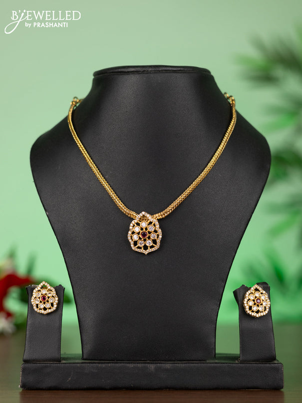 Attigai necklace with floral pendant in red stones