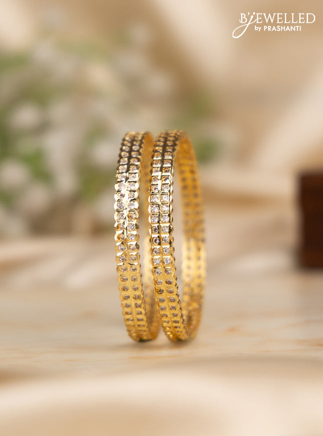 Antique impon bangles with cz stones in gold finish