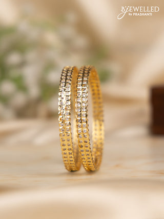 Antique impon bangles with cz stones in gold finish