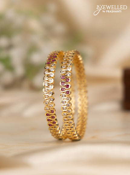 Antique impon bangles with ruby and cz stones in gold finish