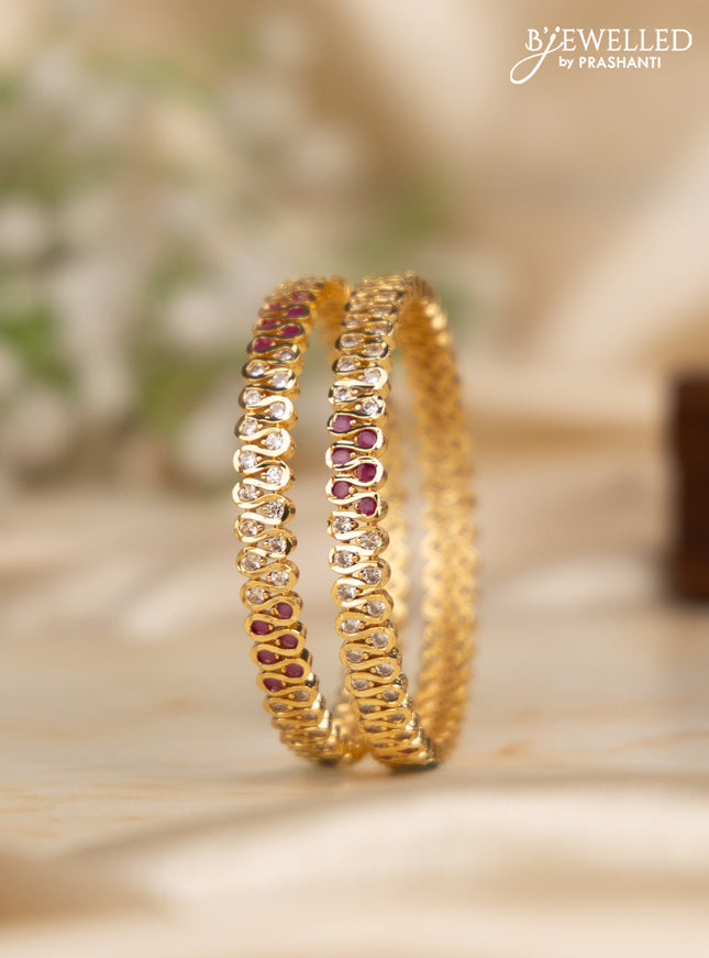 Antique impon bangles with ruby and cz stones in gold finish