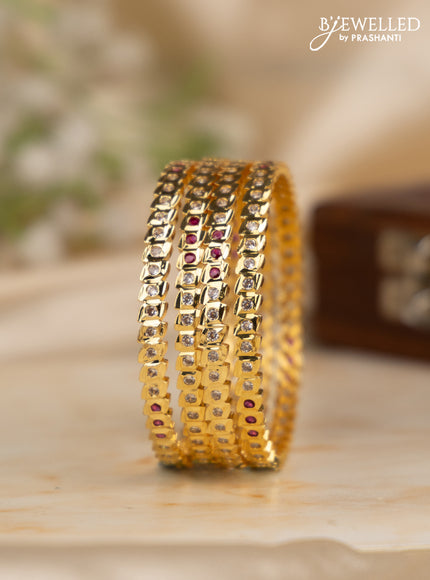 Antique impon bangles with ruby and cz stones in gold finish