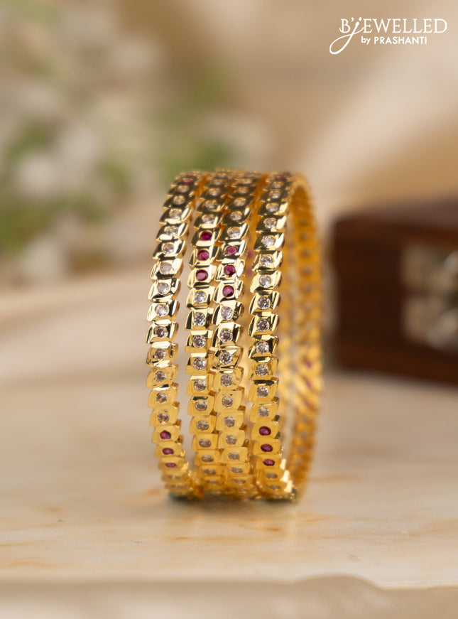 Antique impon bangles with ruby and cz stones in gold finish