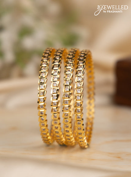 Antique impon bangles with cz stones in gold finish