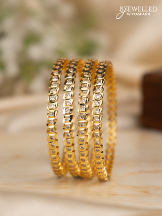 Antique impon bangles with cz stones in gold finish