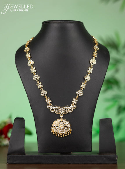 Attigai impon necklace with floral pendant in white stones