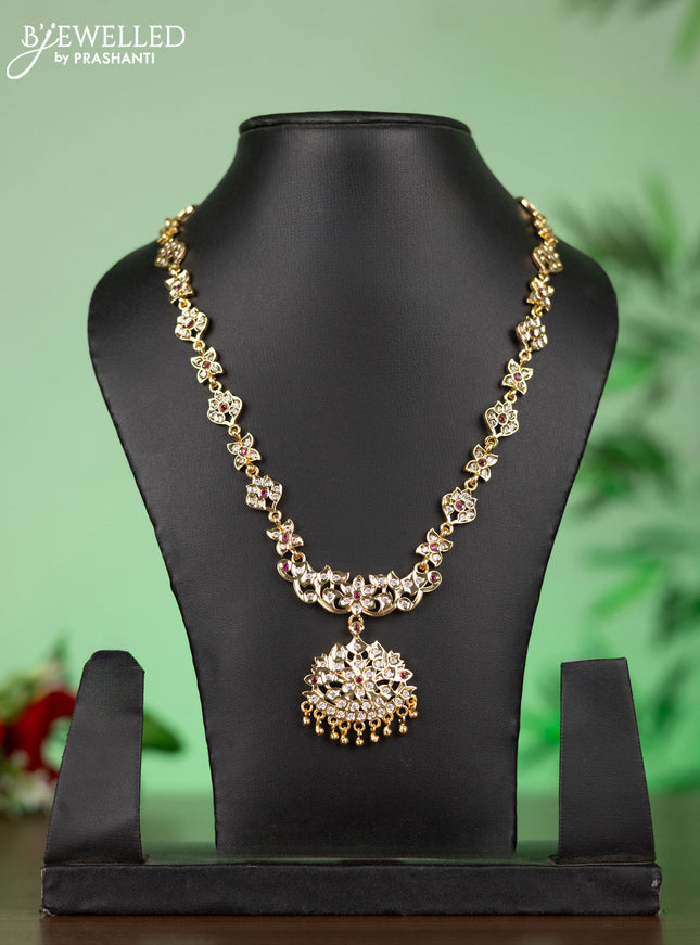 Attigai impon necklace with floral pendant in red and white stones